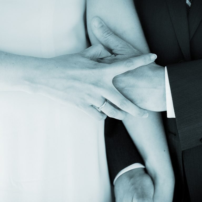 image_0004_midsection-bride-bridegroom-holding-hands